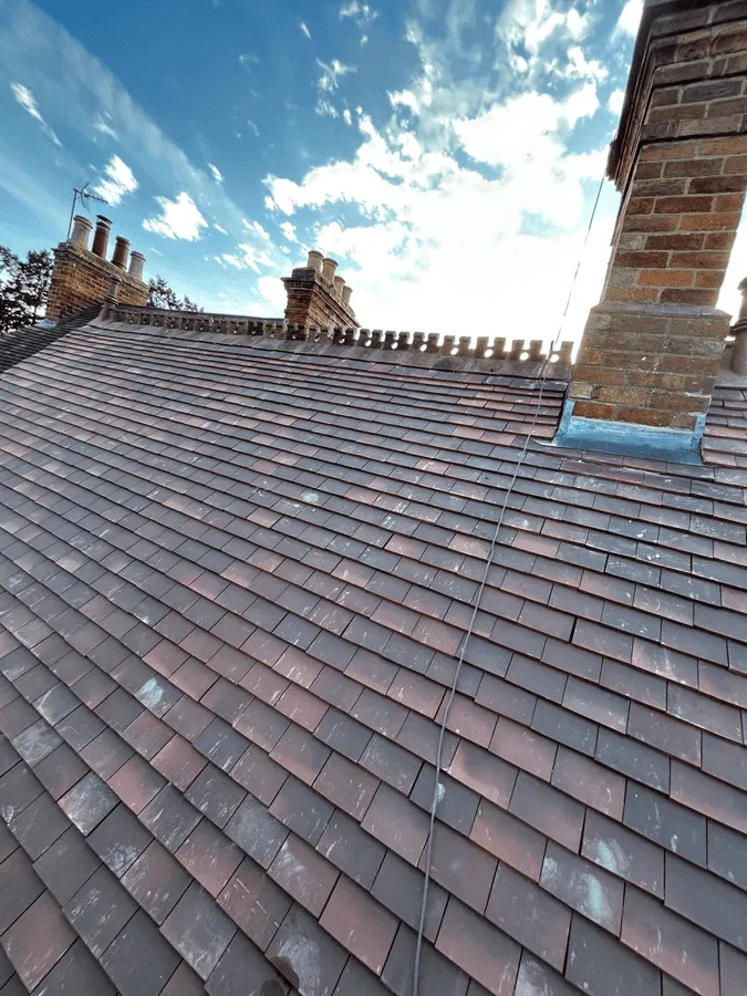 Chimney brickwork and lead repair on heritage roof